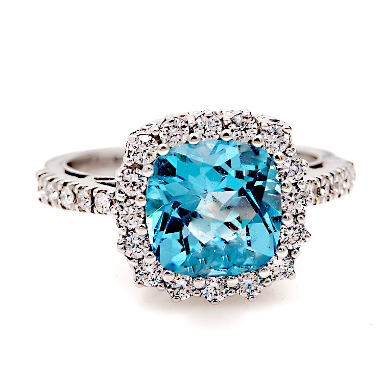 Δαχτυλίδι από λευκόχρυσο 18 Καρατίων με Μπριγιάν και μπλε Τοπάζ.